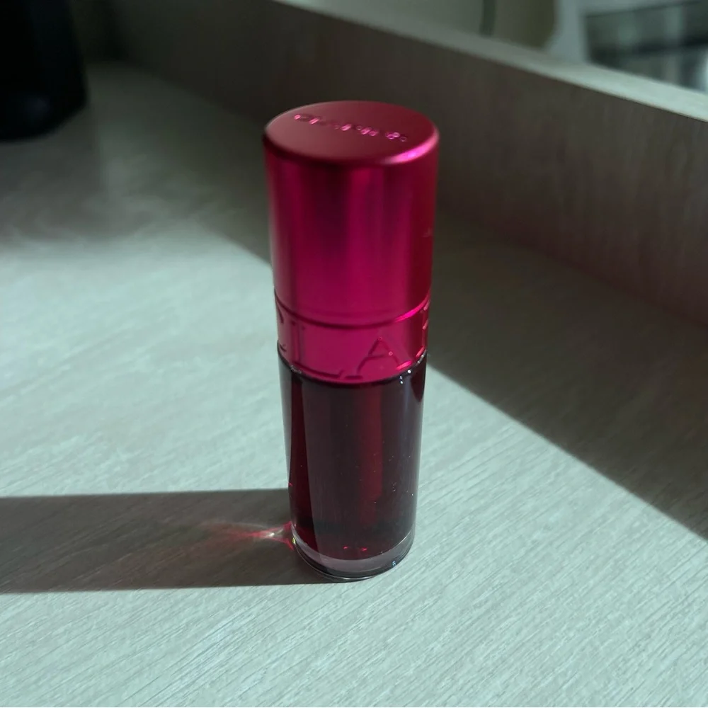 Lightly used Clarins Water Lip Stain - 4 Violet Water - vibrant berry